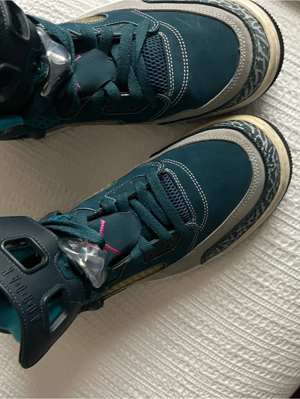 Jordan Spizike Space Teal and Gray Sneakers with Pink Accent.